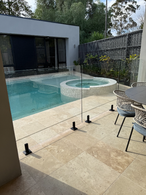 Pool and spa with glass fencing